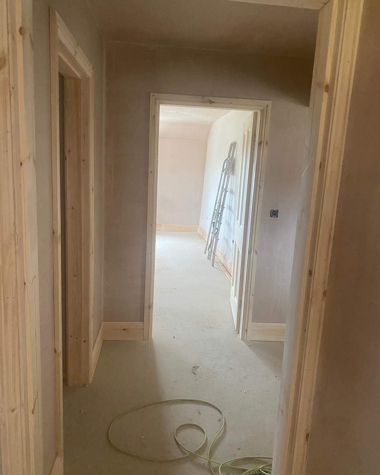 New door linings fitted along a corridor