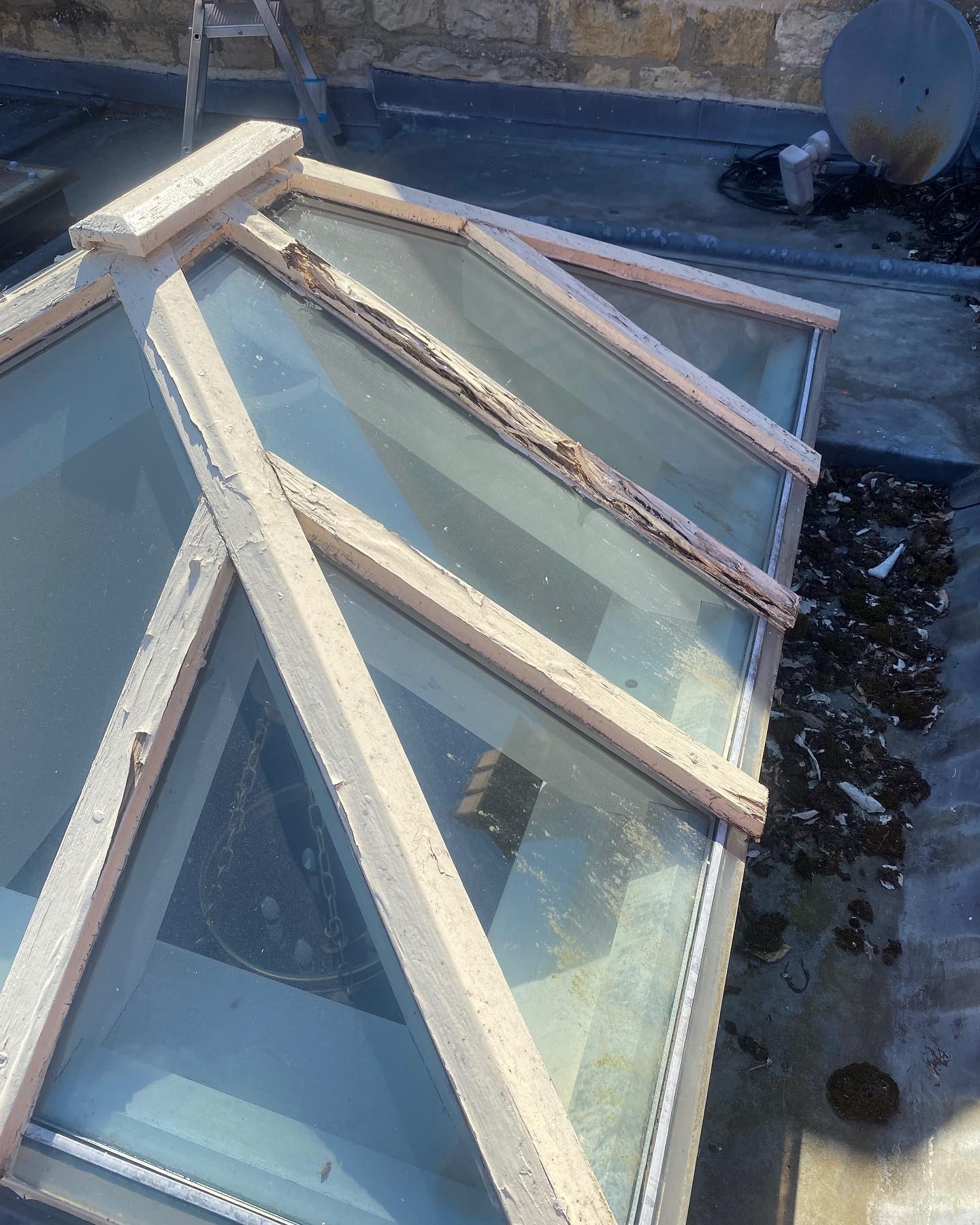 Timber roof lantern frame being repaired on a flat roof